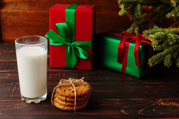 Milk and cookies for Santa Claus under the christmas tree