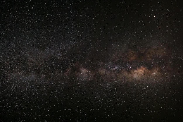 Milky way galaxy with stars and space dust in the universe Long exposure photograph with grain