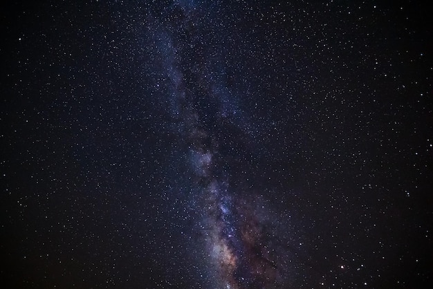 Milky way galaxy with stars and space dust in the universe Long exposure photograph with grainxDxD