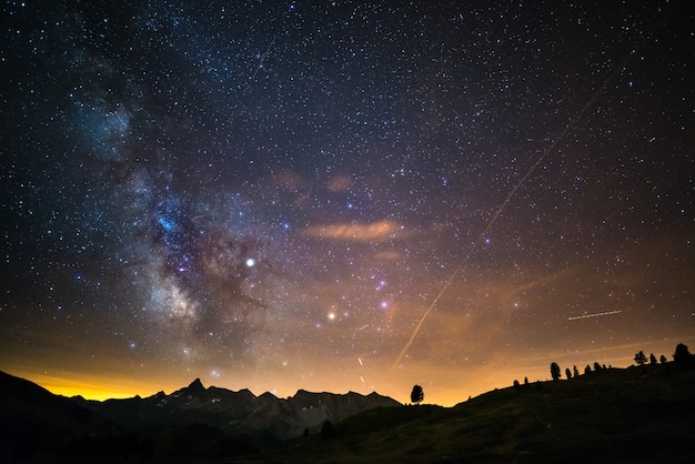  Milky Way and starry sky captured at high altitude in summertime on the Italian Alps