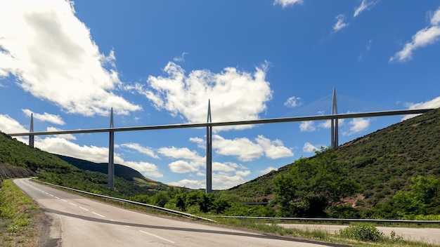 Millau Viaduct above and national road D41 near Millau town Aveyron Occitania Southern France