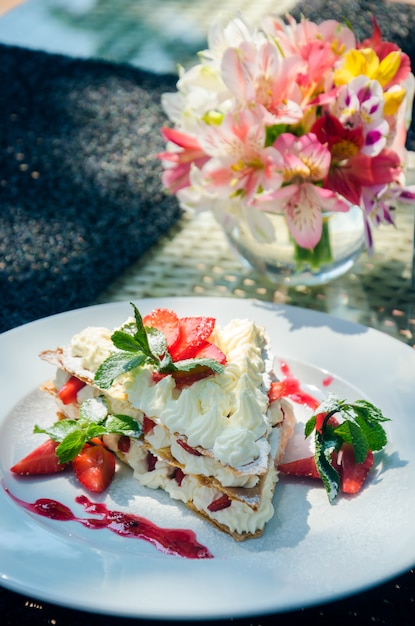 Mille-feuille on a serving table on the summer restaurant grounds