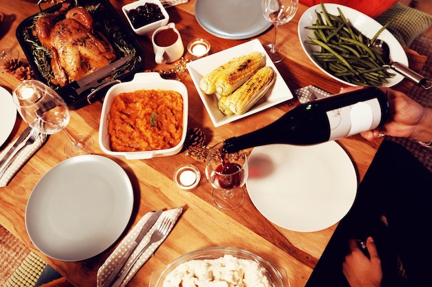 Millennial adult friends celebrating Thanksgiving together at home