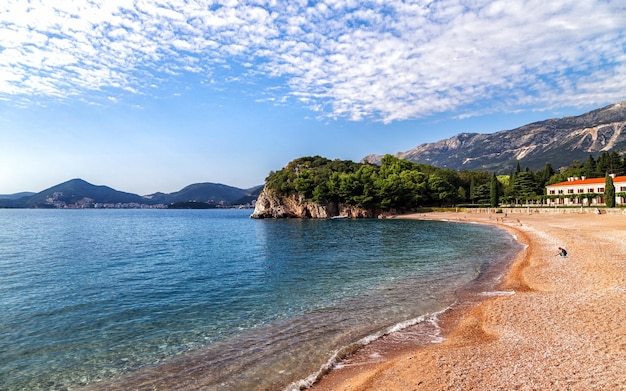 Milocer Beach on Adriatic seashore in Budva Riviera near Saint Stephan island in Montenegro.