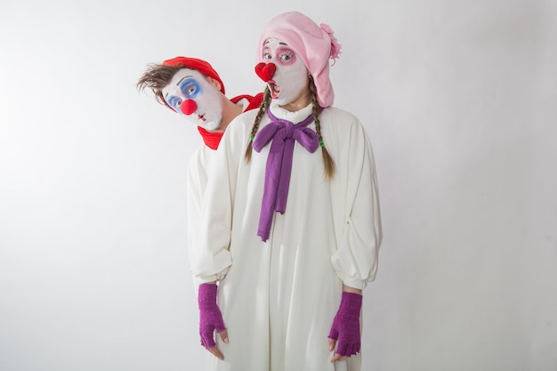 Mime boy and mime girl show emotions surprise