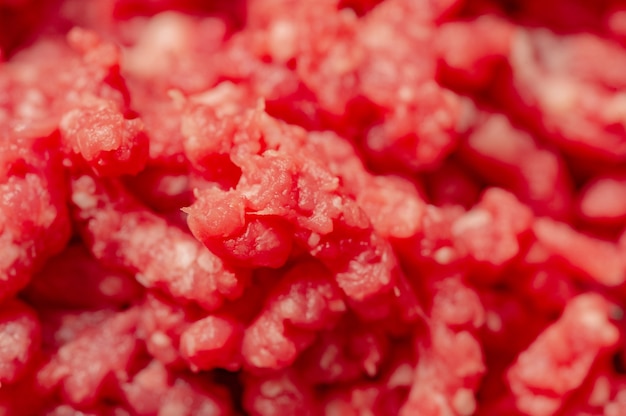 Minced beef close-up in a metal plate. Minced cutlets cooking for dinner. beef, grinder, raw, food, meat, cooking.