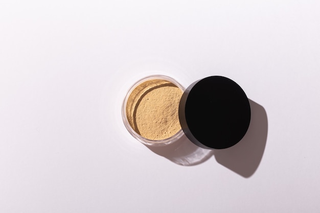 Mineral powder foundation isolated on a white background ecofriendly and organic beauty products