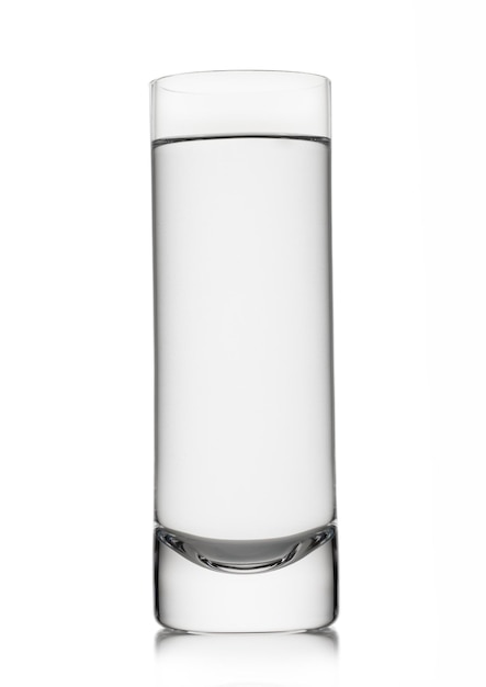 Mineral still water in highball glass on white