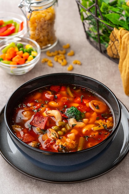 Minestrone Soup is a thick soup of Italian origin made with vegetables and pasta