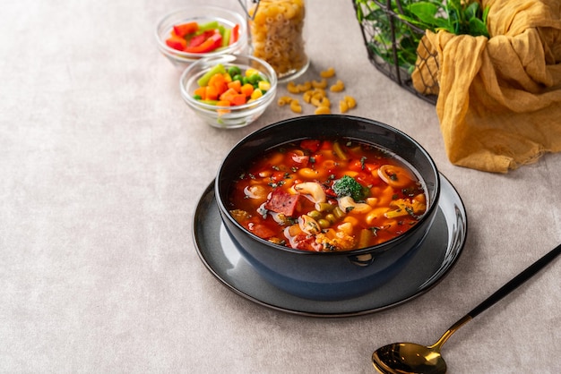 Minestrone Soup is a thick soup of Italian origin made with vegetables and pasta