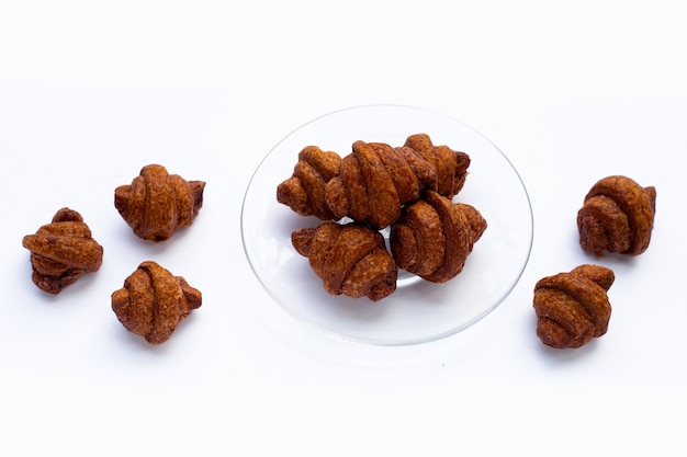 Mini chocolate croissant on white background.