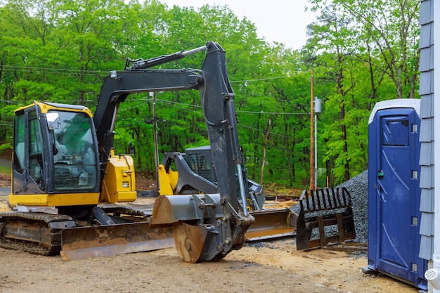 Mini excavator on construction site for working in small places