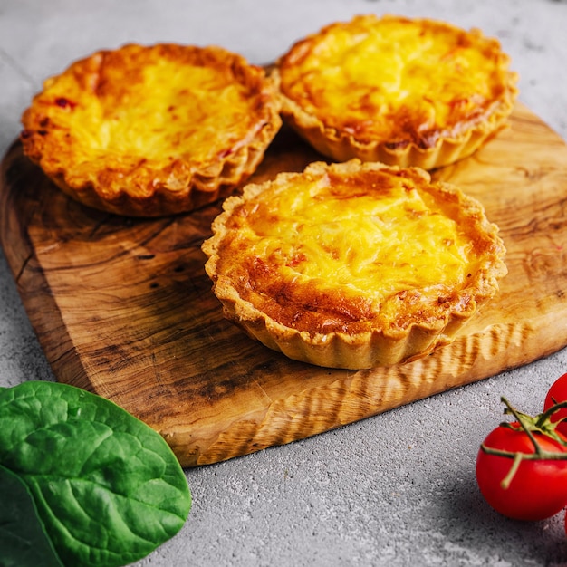 Mini quiche lorraine with cheddar cheese