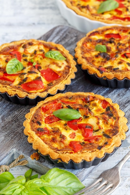 Mini quiche with chicken onion and sweet pepper