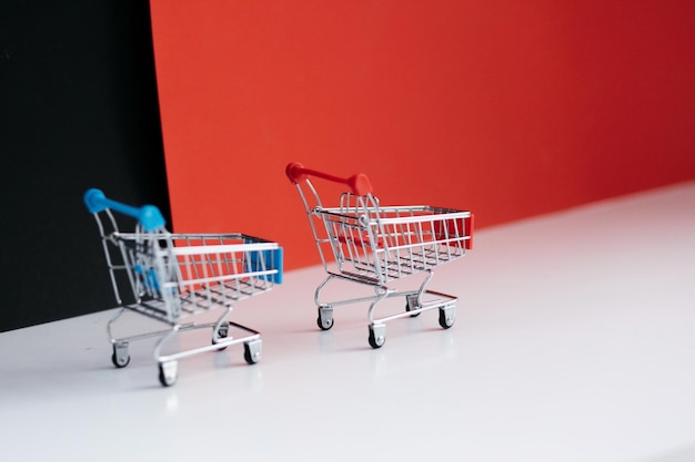 Mini shopping cart shop concept Empty top view mini shopping cart or trolley shopping on background concept shopping in supermarket