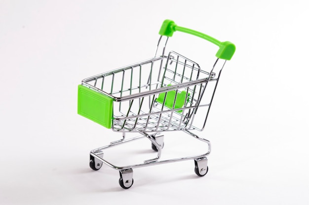 Mini shopping trolley on a white background.