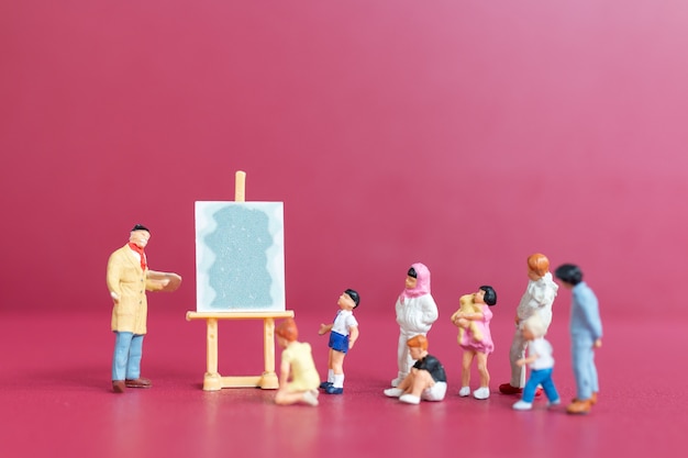 Miniature people art painting class with school children , Education concept