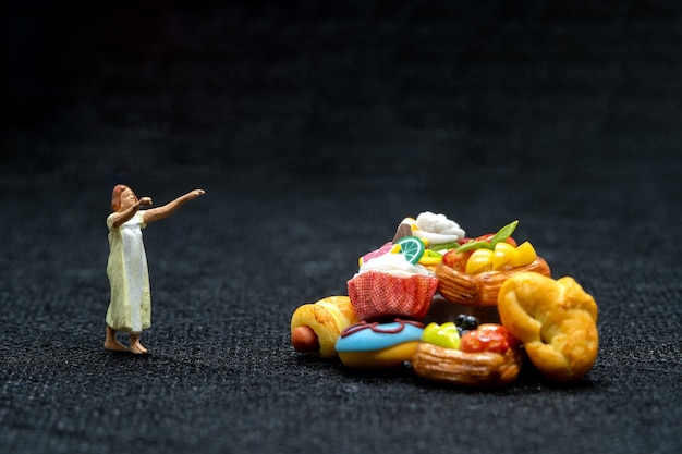 Miniature people Female sleepwalker in pajama dream about snack at night