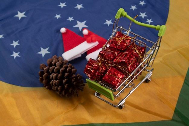 Miniature of shopping cart with gifts inside