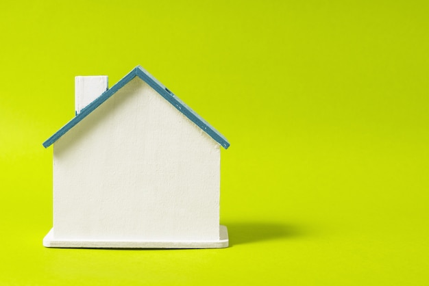 Miniature wooden house, symbol