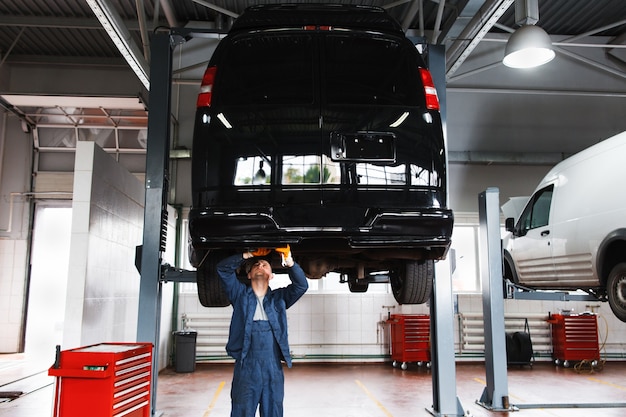 Minibus service maintenance in garage