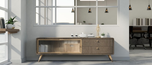 A minimal class wooden cabinet with accessories against the white wall