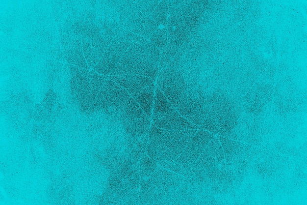 Minimal grunge texture background of cyan color cement plaster wall