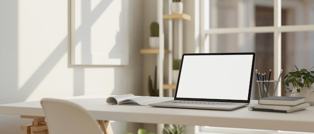 Minimal home workplace or office studio interior design with portable notebook laptop mockup