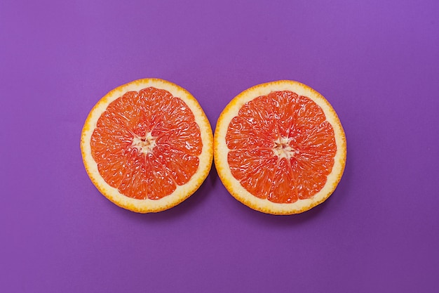 Minimal style, creative layout oranges on purple background