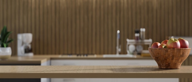 Minimal wood dining tabletop with empty montage space over blurred modern minimal wood kitchen