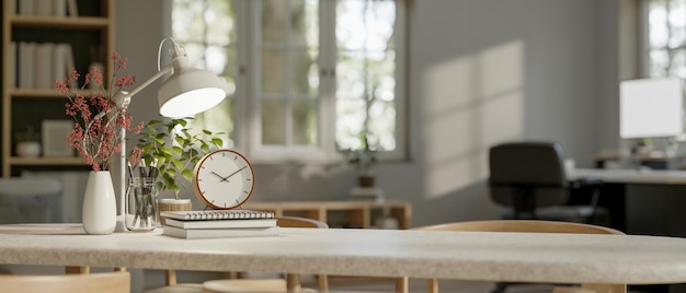 A minimal workspace tabletop with decor and copy space over in modern home working room