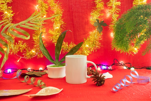 Minimalist concept idea displaying products. coffee mug on christmas and new year background