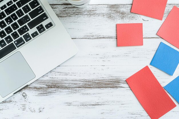 Photo minimalist flat lay yellow notebook and white keyboard