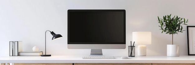 Minimalist modern desk with computer and decor concept of clean and organized workspace