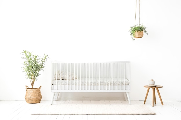 Minimalist Nursery Interior with White Crib and Natural Elements