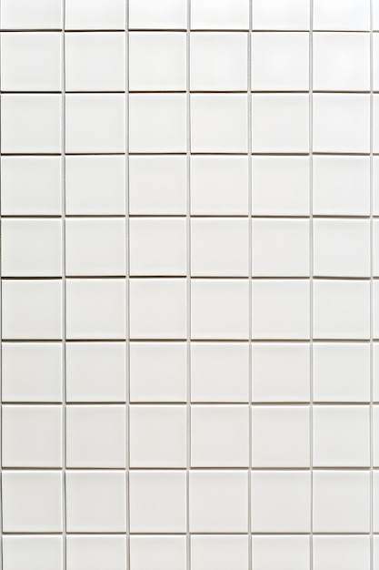 Photo minimalist plain white tiled bathroom wall with square pattern for clean bright aesthetic