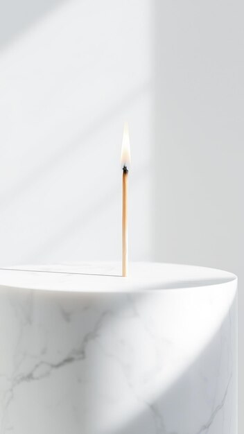 Photo minimalist white marble cylinder with a lit match