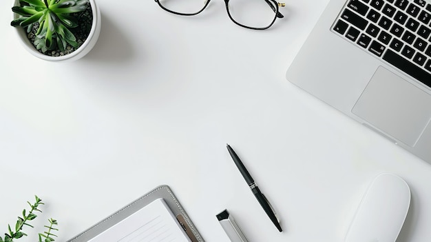 Photo minimalist workspace with white laptop glasses pen clipboard and succulent plant concept of modern office desk work organization productivity minimalist design top view mockup copy space