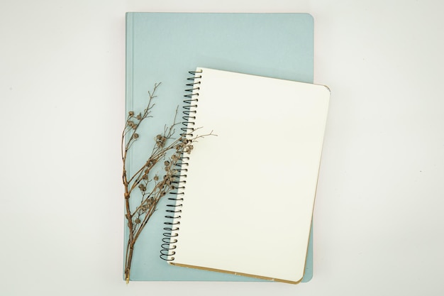 Minimalistic background with blank notepad flat lay