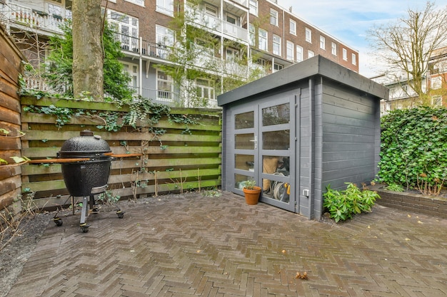 Minimalistic bright and landscaped backyard with dining area