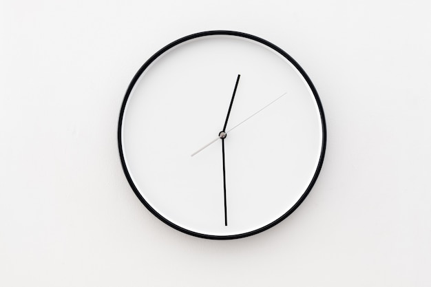 A minimalistic clock hanging on the wall