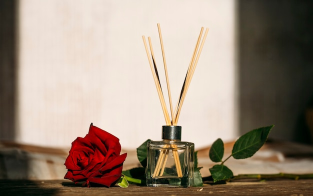 Minimalistic composition with aroma sticks and aroma oil copy space