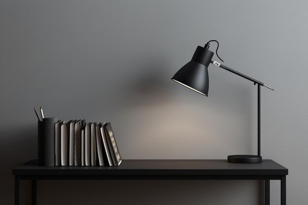 Minimalistic workspace with lamp and books