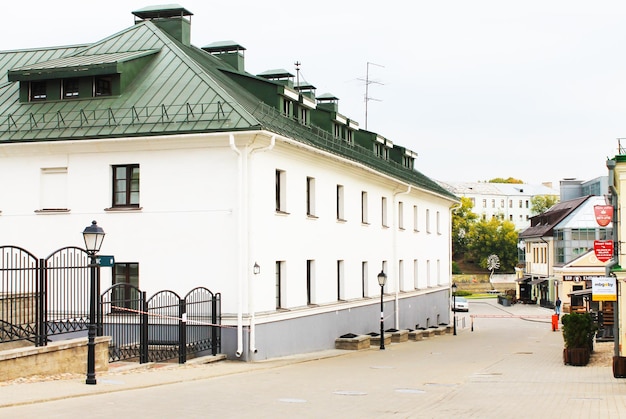 Minsk Belarus cozy white houses with a green roof in the upper city