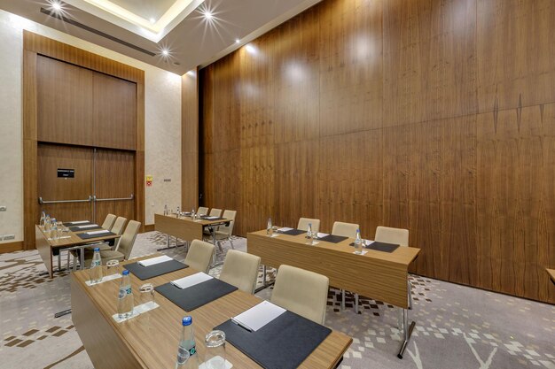 MINSK BELARUS JULY 2017 rows of seats in interior of modern empty conference hall for business meetings