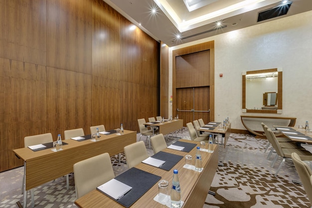 MINSK BELARUS JULY 2017 rows of seats in interior of modern empty conference hall for business meetings