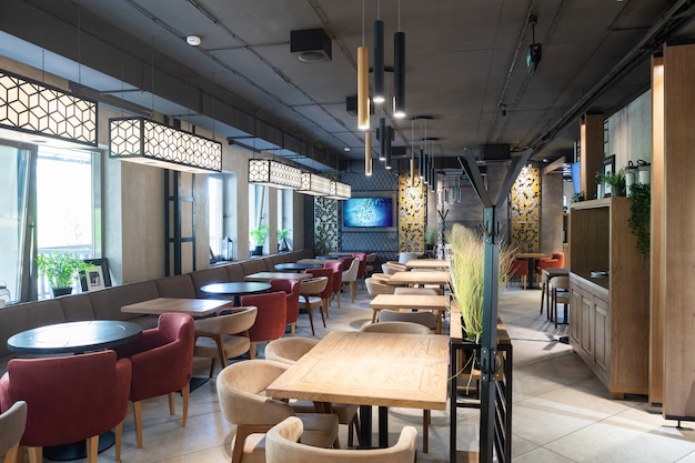 Minsk, Belarus - May 29, 2019: Interior of a modern urban restaurant in the morning sunlight