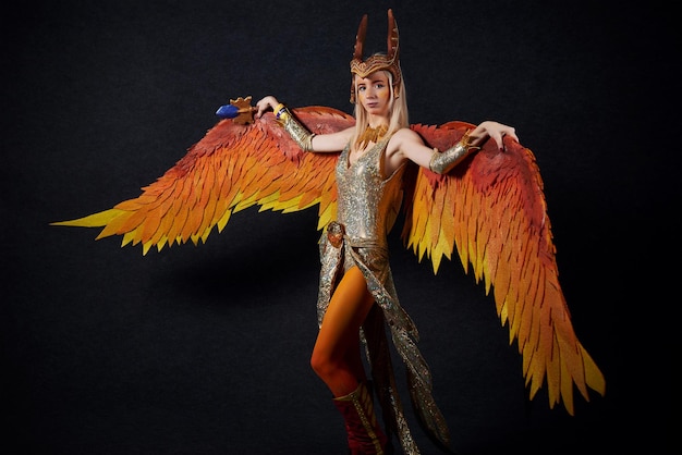 MINSK BELARUS NOVEMBER 03 2018 UniSon Convention Game Expo Minsk 2018 Cosplayer young woman dressed as Phoenix from Dota 2