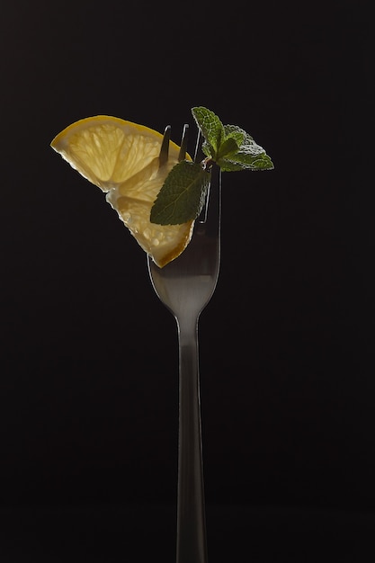 Mint and lemon on a fork