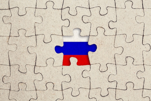 Missing jigsaw puzzle piece and russian flag.